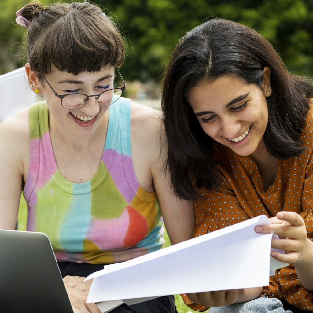 Diverse students studying together at college campus